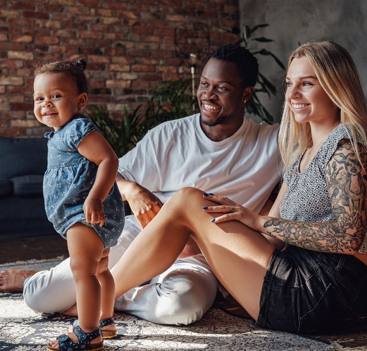 mother-and-father-playing-with-their-daughter